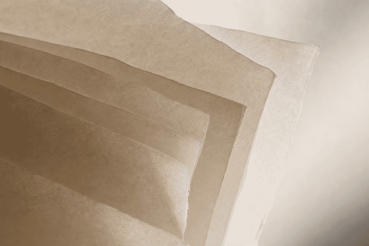backlit layered translucent paper, warm taupe tones, still life